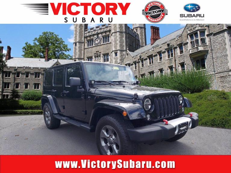 Used 2014 Jeep Wrangler Unlimited Sahara for sale Sold at Victory Lotus in New Brunswick, NJ 08901 1